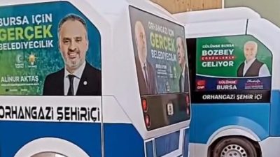 Bursa'nın Orhangazi ilçesinde şehir içi yolcu taşımacılığı yapan minibüslerin camlarına