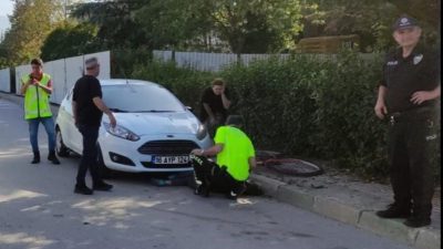 Bursa'nın Orhangazi ilçesinde meydana gelen trafik kazasında otomobil bisikletli çocuğa