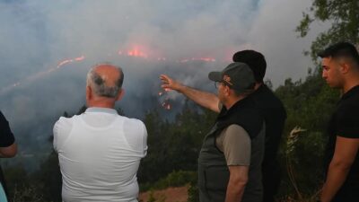 Bursa ve Balıkesir arasında başlayan orman yangını ekiplerin yoğun müdahalesiyle