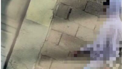 Bursa'nın Orhangazi ilçesinde, bir okul yakınında kılıf içinde tüfek taşıdığı